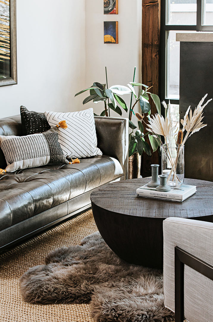 Modern Industrial Lounge - Leather Restoration Hardware Sofa with Fur Rug and Black Drum Coffee Table - Denver, CO 