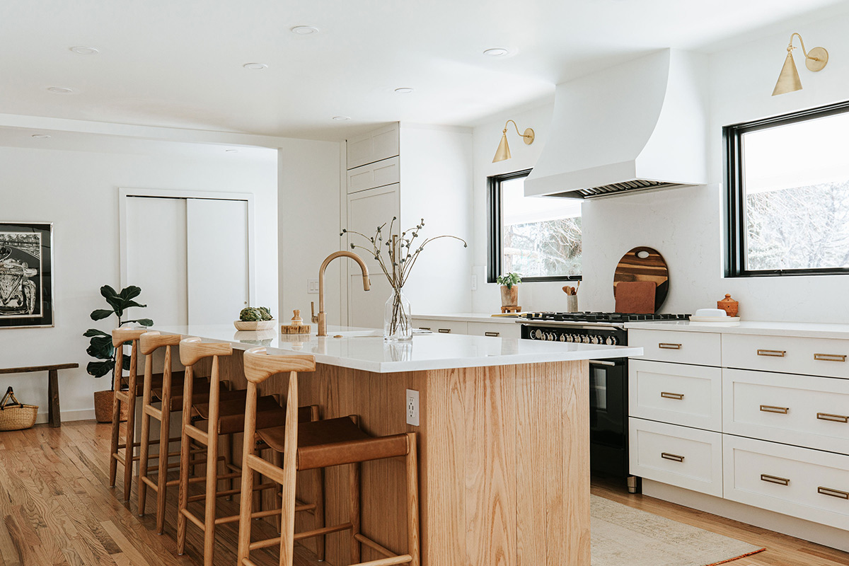 White Shaker and White Oak Cabinets with Brass Hardware Drywall Range Hood Kitchen Remodel in Denver Colorado by J. Reiko Design + Co 