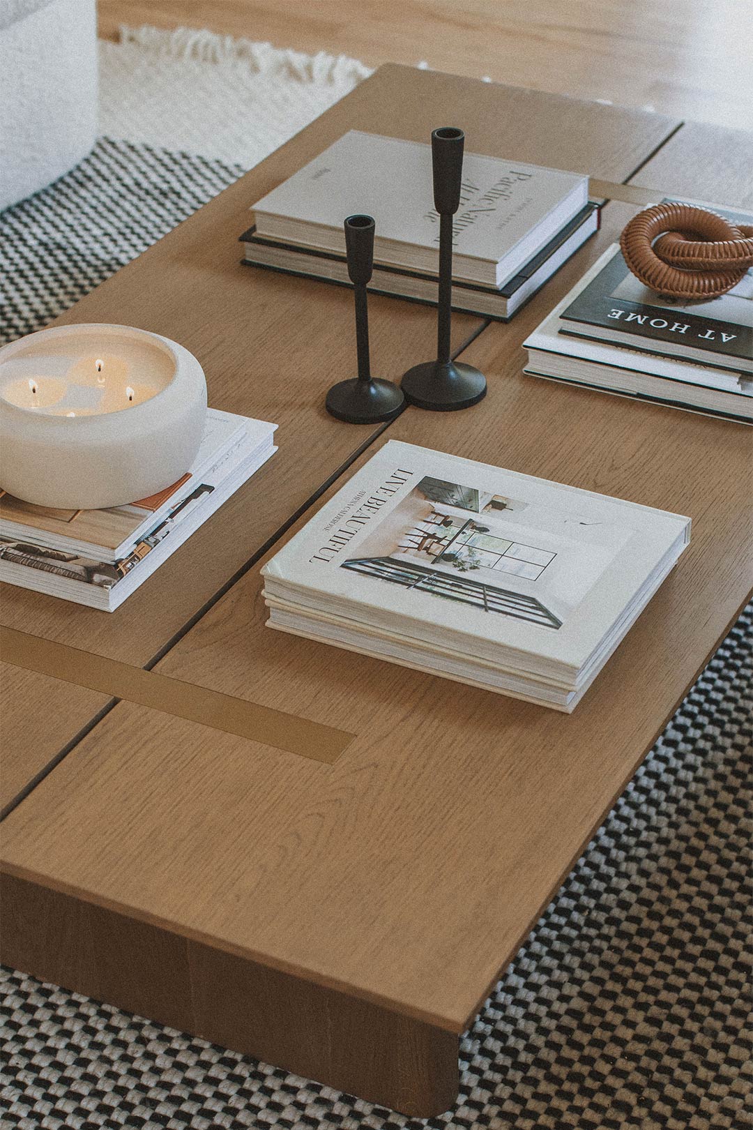 View of the styling done on the coffee table by Jennifer Murphy of J. Reiko Design + Co