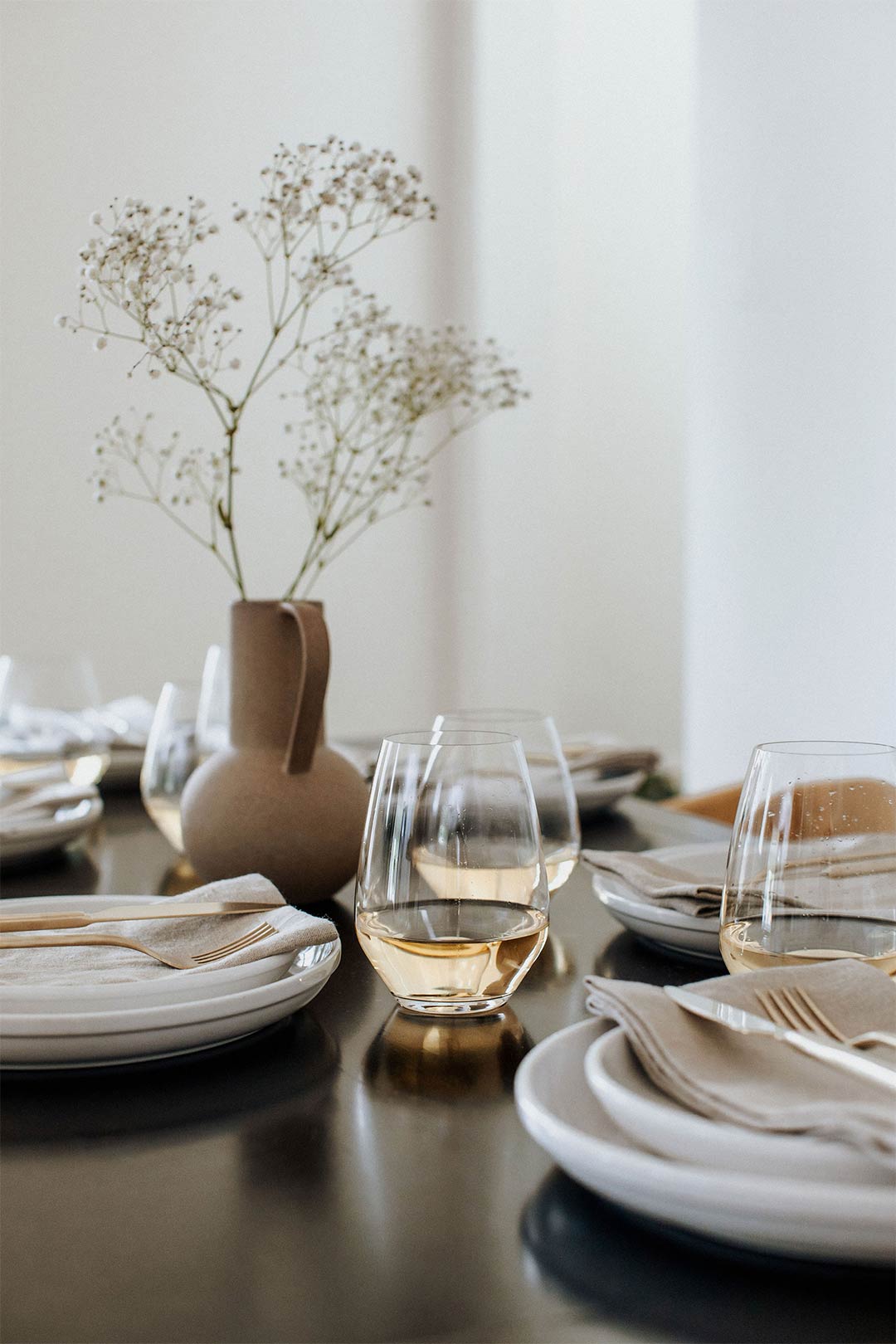 Close up photography of the dining table styling in an Organic-Modern remodel by Jennifer Murphy and J. Reiko Design + Co