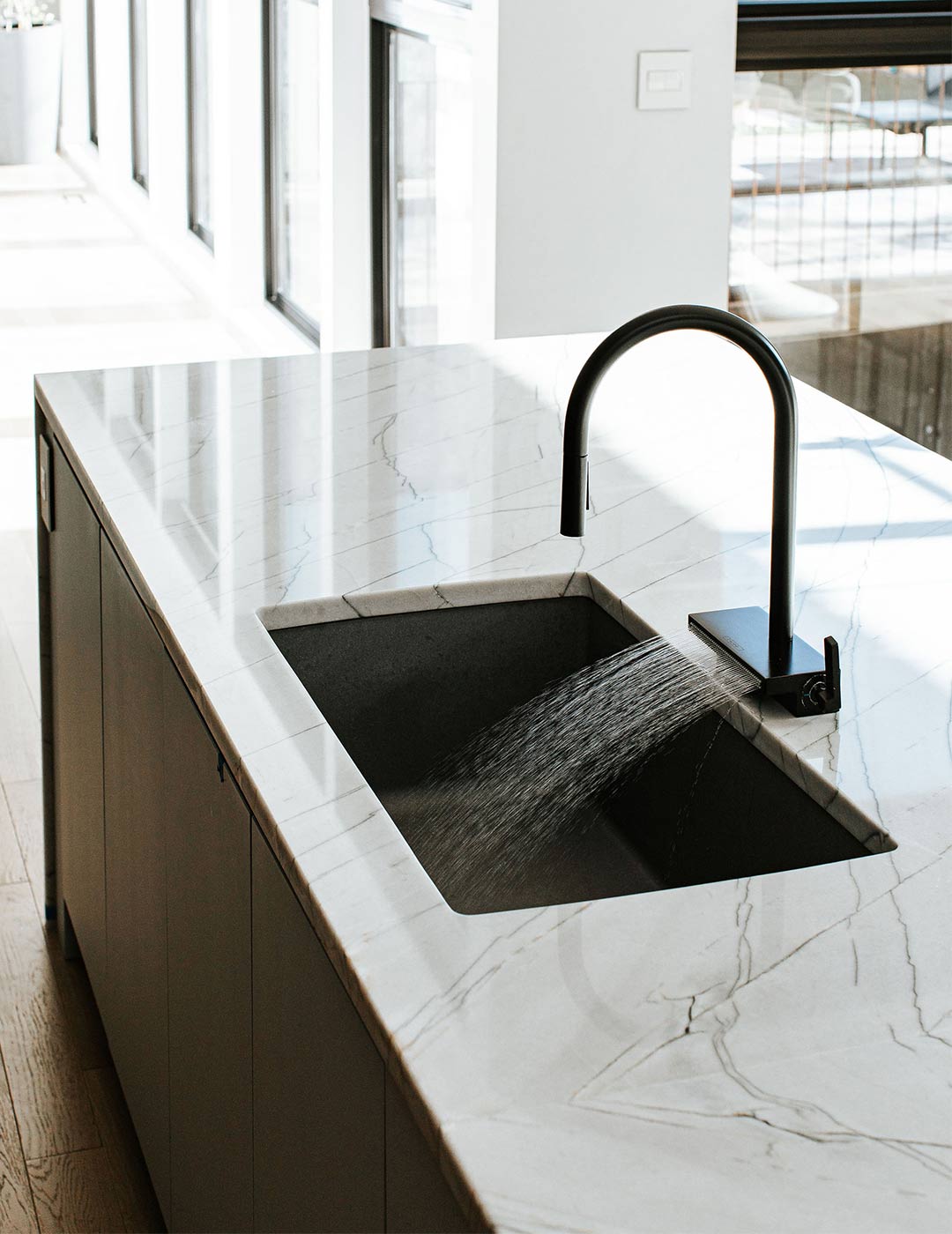 Natural materials and using a stone countertop in the kitchen at project Alcott