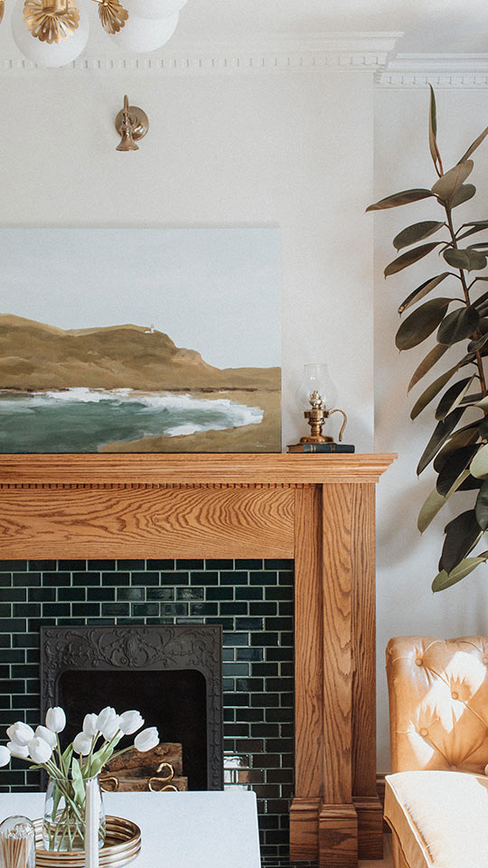 J. Reiko Design + Co. - Selecting Finishes - 7 A fireplace with historic mantle details in a home in Denver Colorado, the custom millwork showcases how important the interior design finish selections are.