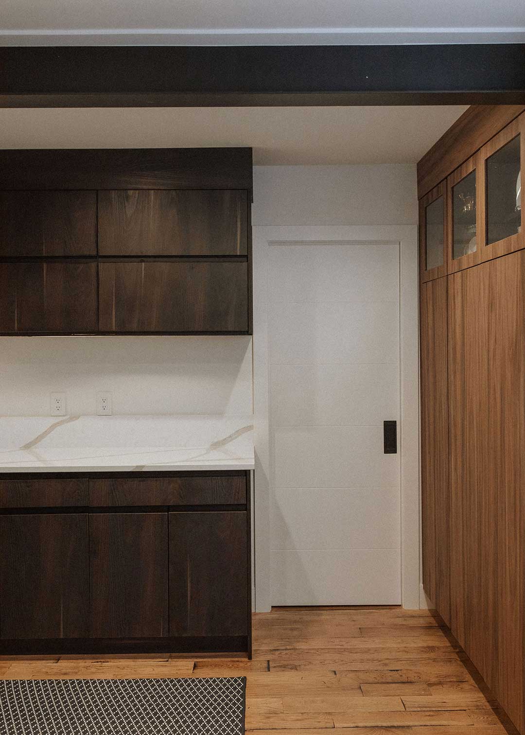 J. Reiko-Design + Co. - Working Pantry - 11 A modern minimalist working pantry designed by J. Reiko Design + Co. features a layered two toned cabinet palette and ample working space.