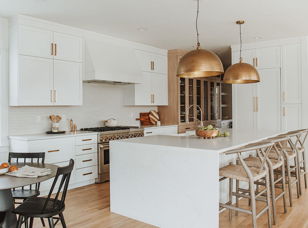 Kitchen and kitchen island  'after' image - J. Reiko Design + Co - Hudson Street Project - before and after of a modern classic interior design project