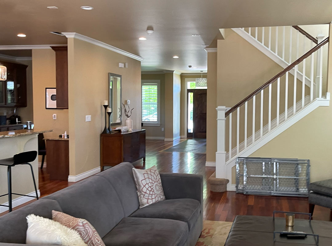 Staircase & living room  'before' image - J. Reiko Design + Co - Hudson Street Project - before and after of a modern classic interior design project