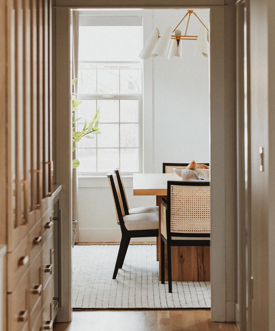 Butlers pantry to the dining room 'after' image - J. Reiko Design + Co - Hudson Street Project - before and after of a modern classic interior design project