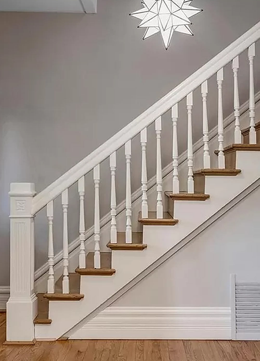 Staircase & custom moulding 'before' image - J. Reiko Design + Co - Julien Street Project - before and after of a Denver Square restoration remodel with Victorian charm and playful English-inspired design