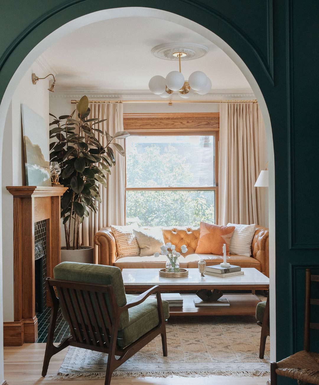 Fireplace 'after' image - J. Reiko Design + Co - Julien Street Project - before and after of a Denver Square restoration remodel with Victorian charm and playful English-inspired design