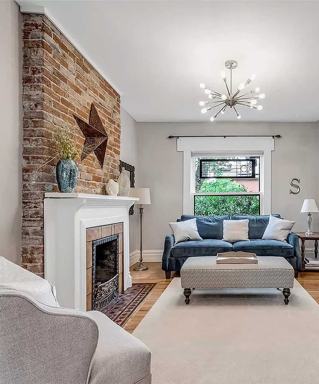 Fireplace 'before' image - J. Reiko Design + Co - Julien Street Project - before and after of a Denver Square restoration remodel with Victorian charm and playful English-inspired design