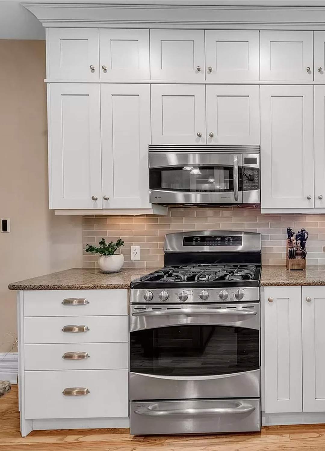 Kitchen 'before' image - J. Reiko Design + Co - Julien Street Project - before and after of a Denver Square restoration remodel with Victorian charm and playful English-inspired design