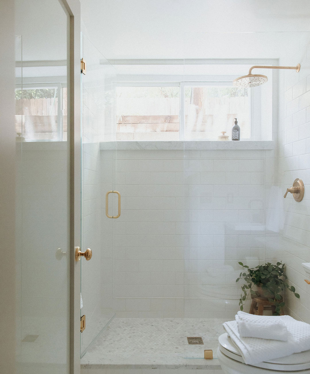 Guest bath addition 'after' image - J. Reiko Design + Co - Julien Street Project - before and after of a Denver Square restoration remodel with Victorian charm and playful English-inspired design