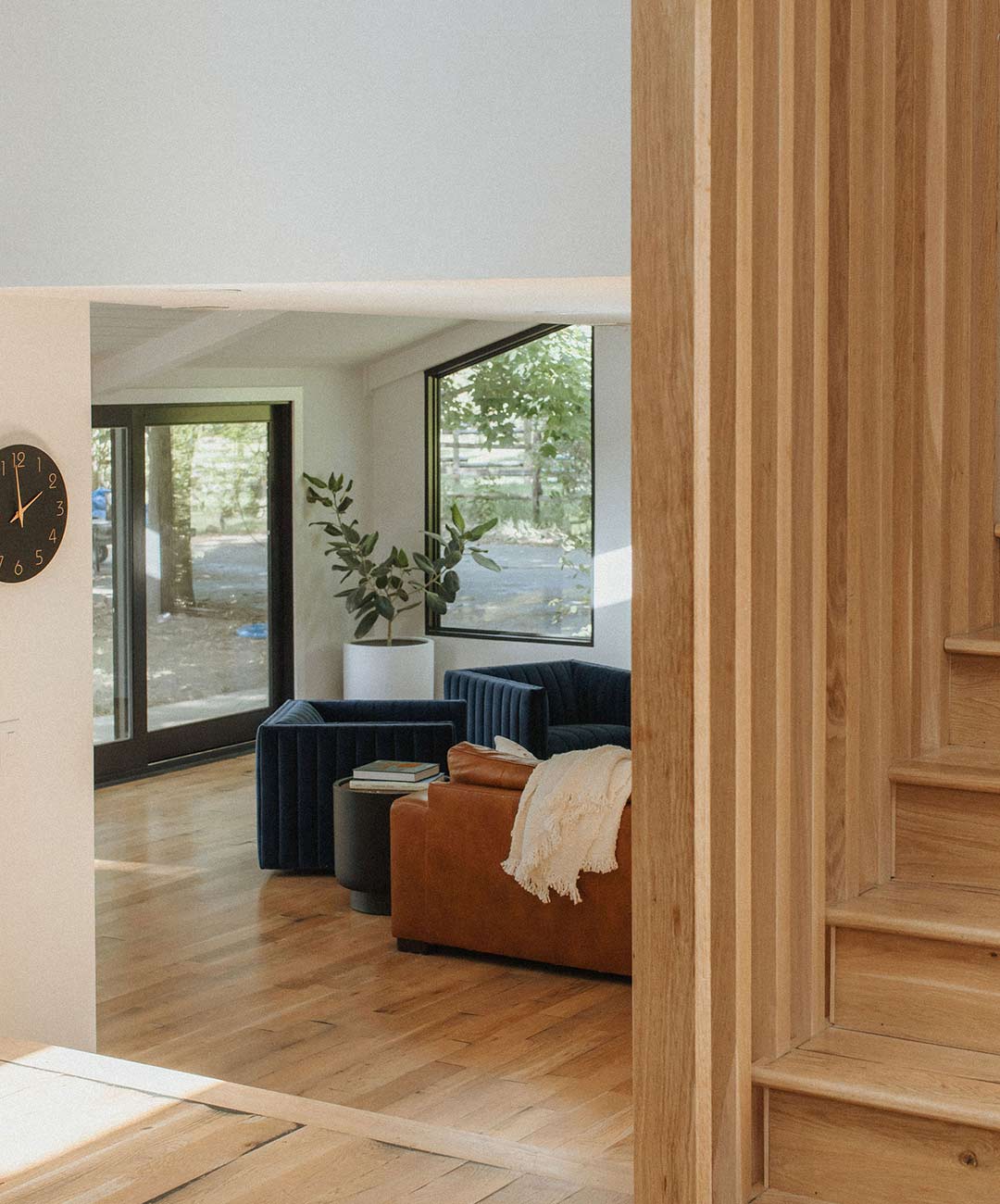 Stairwell 'after' image - J. Reiko Design + Co - Plateau Court Project - before and after of a rural mid-century modern remodel for indoor outdoor living