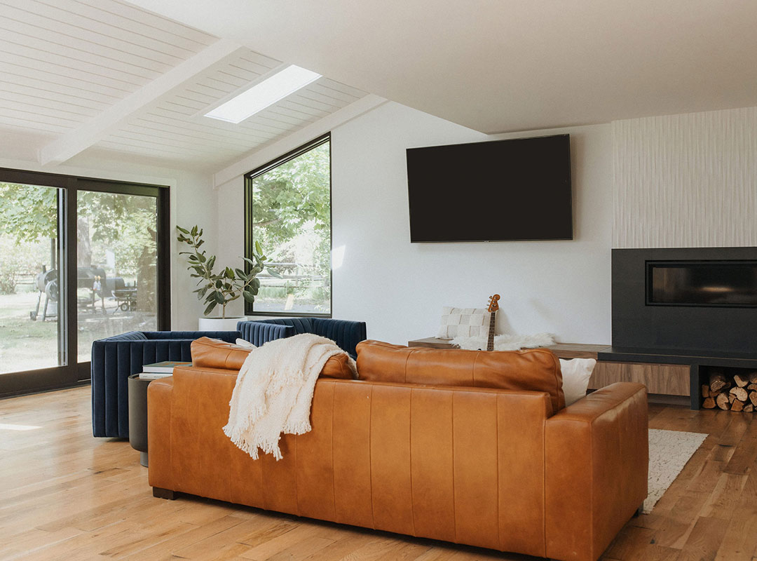 Living room 'after' image - J. Reiko Design + Co - Plateau Court Project - before and after of a rural mid-century modern remodel for indoor outdoor living