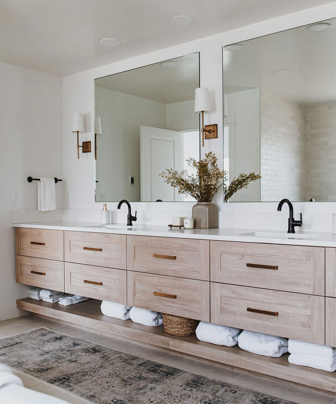 Primary bathroom's double vanity 'after' image - J. Reiko Design + Co - Hudson Street Project - before and after of a modern classic interior design project