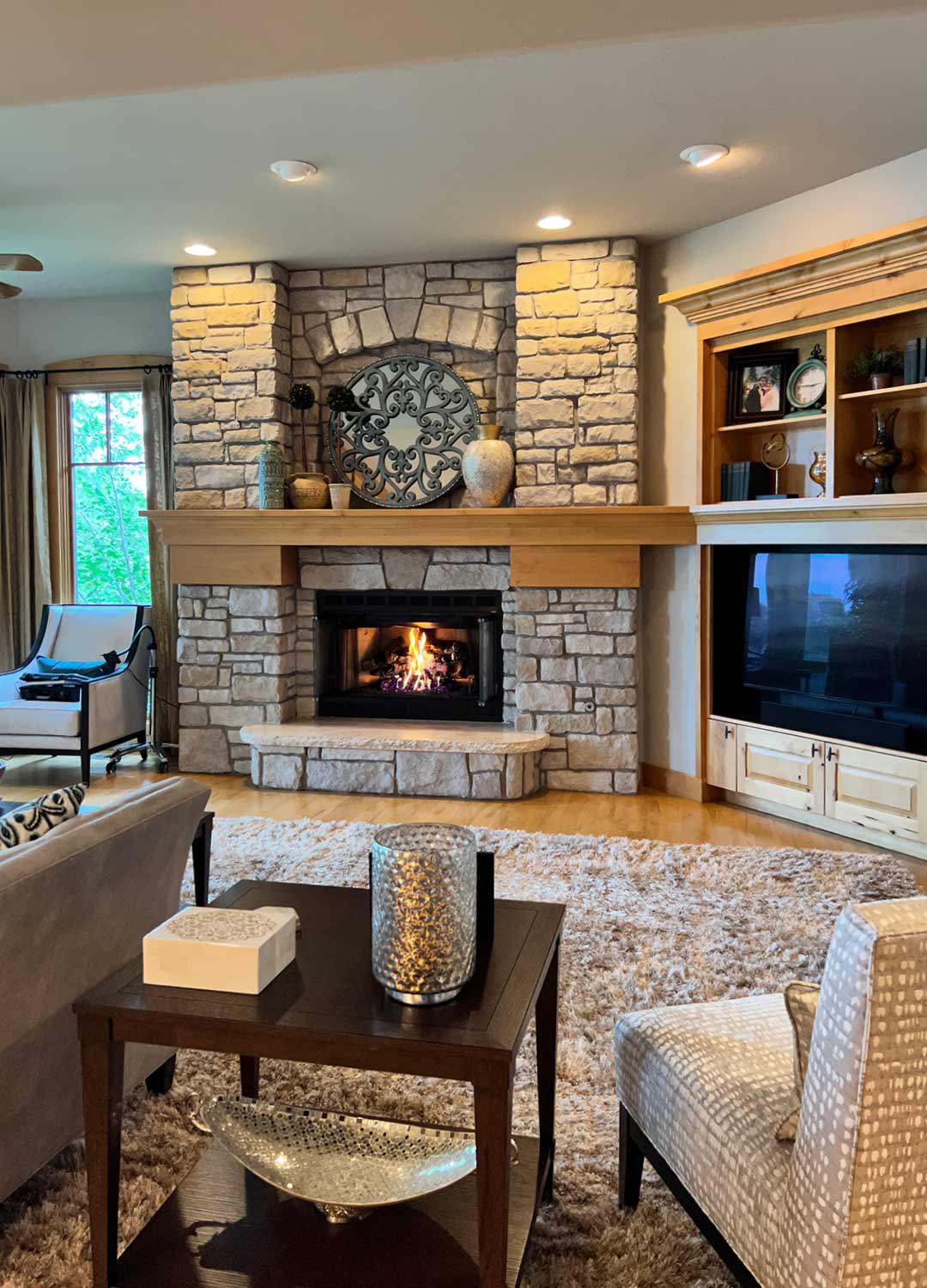 Fireplace 'before' image - J. Reiko Design + Co - Three Eagles Drive Project - before and after of a rustic and traditional mediterranean-inspired home in Fort Collins, Colorado