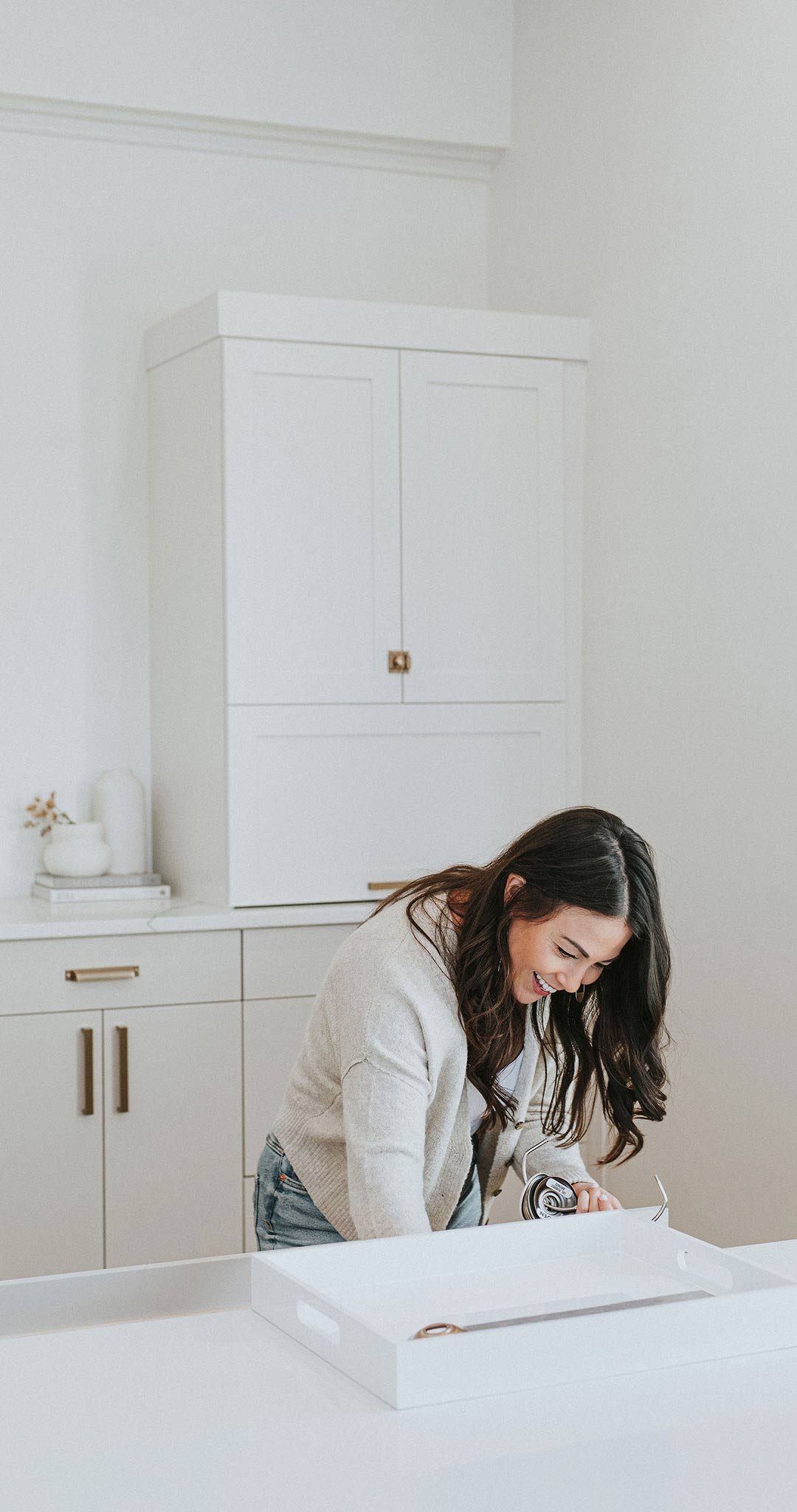 Jenny Murphy, Principal Designer and Founder of J. Reiko Design + Co searches through a drawer of samples in her studio.