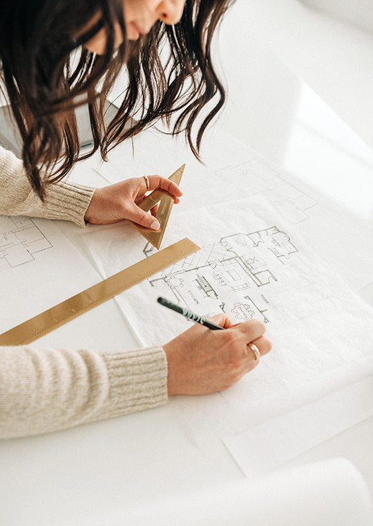 J. Reiko Design + Co. - Questions to Ask an Interior Designer - 03 A close up view of interior designer Jenny Murphy sketching out floor plans.