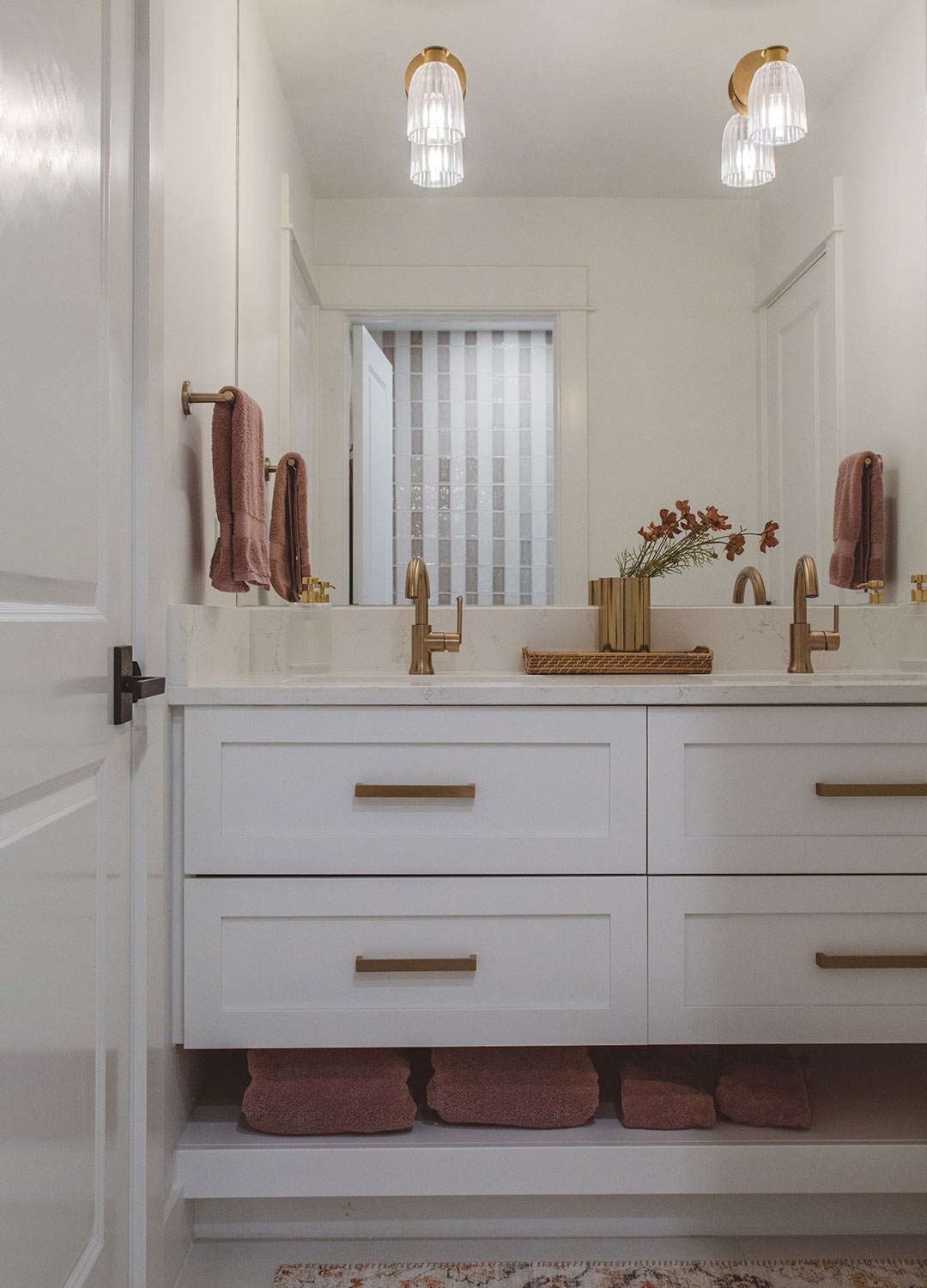 Girl's bathroom 'after' image - J. Reiko Design + Co - Hudson Street Project - before and after of a modern classic interior design project