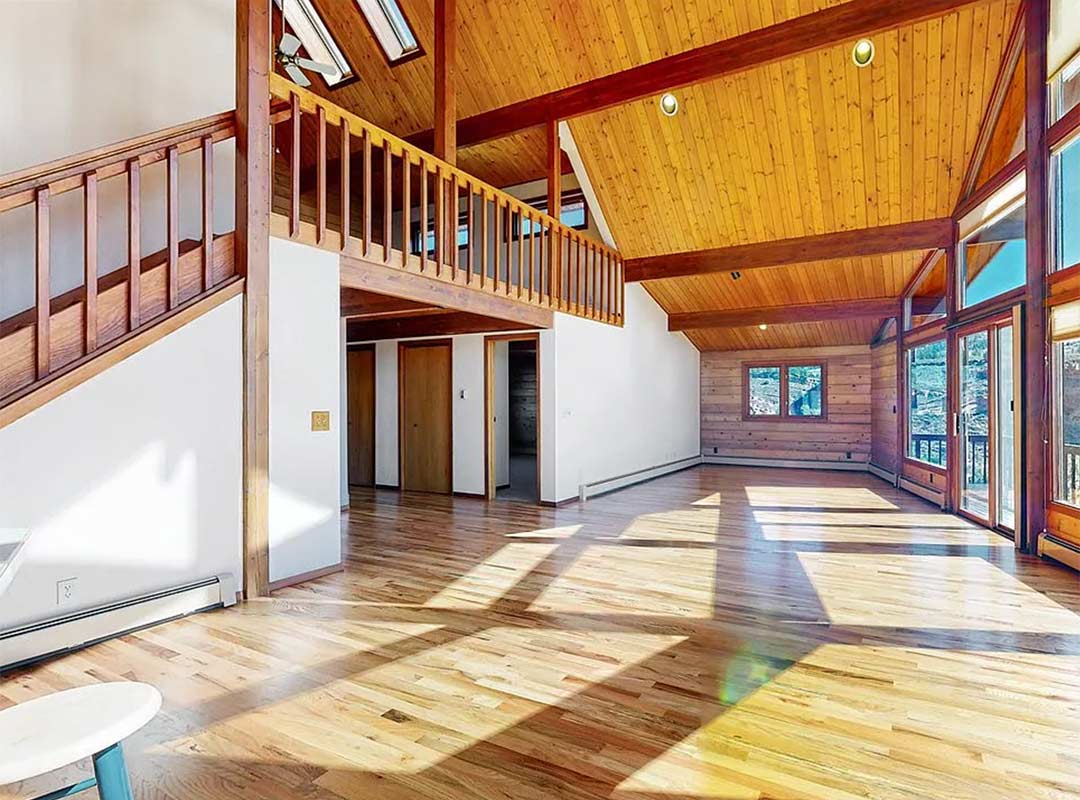 Living 'before' image - J. Reiko Design + Co - Redstone Canyon Project - before and after of a mountain modern remodel in Fort Collins, Colorado