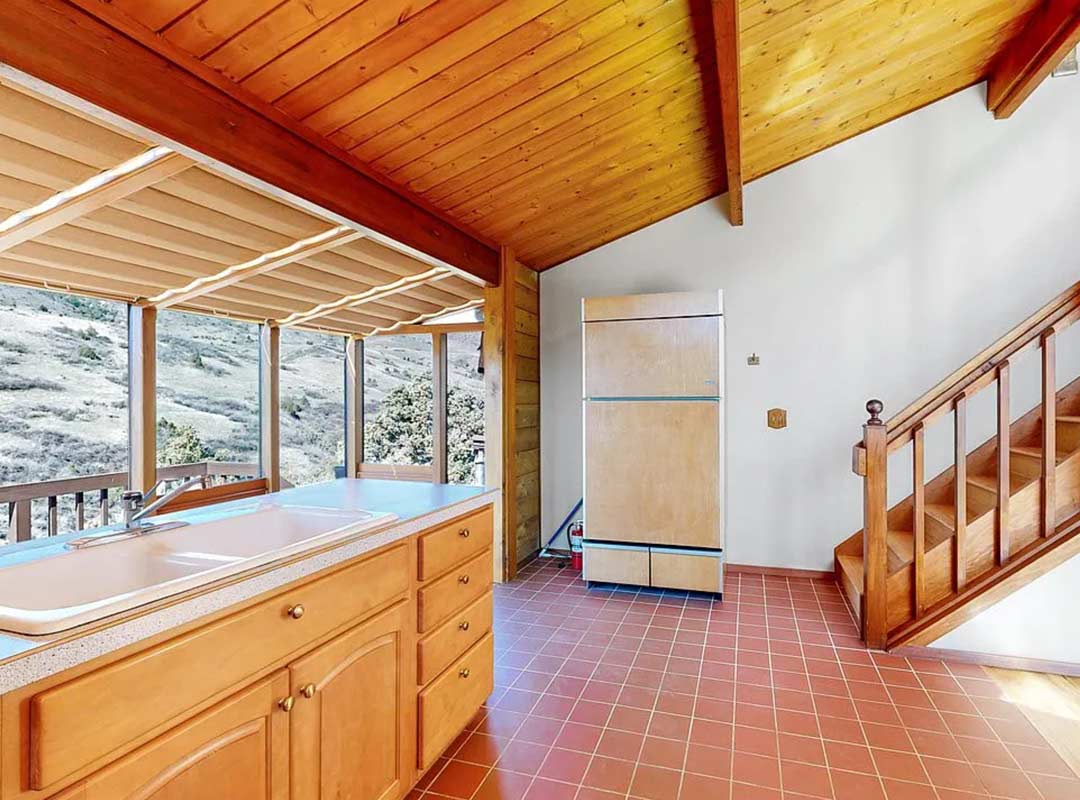 Stairs 'before' image - J. Reiko Design + Co - Redstone Canyon Project - before and after of a mountain modern remodel in Fort Collins, Colorado