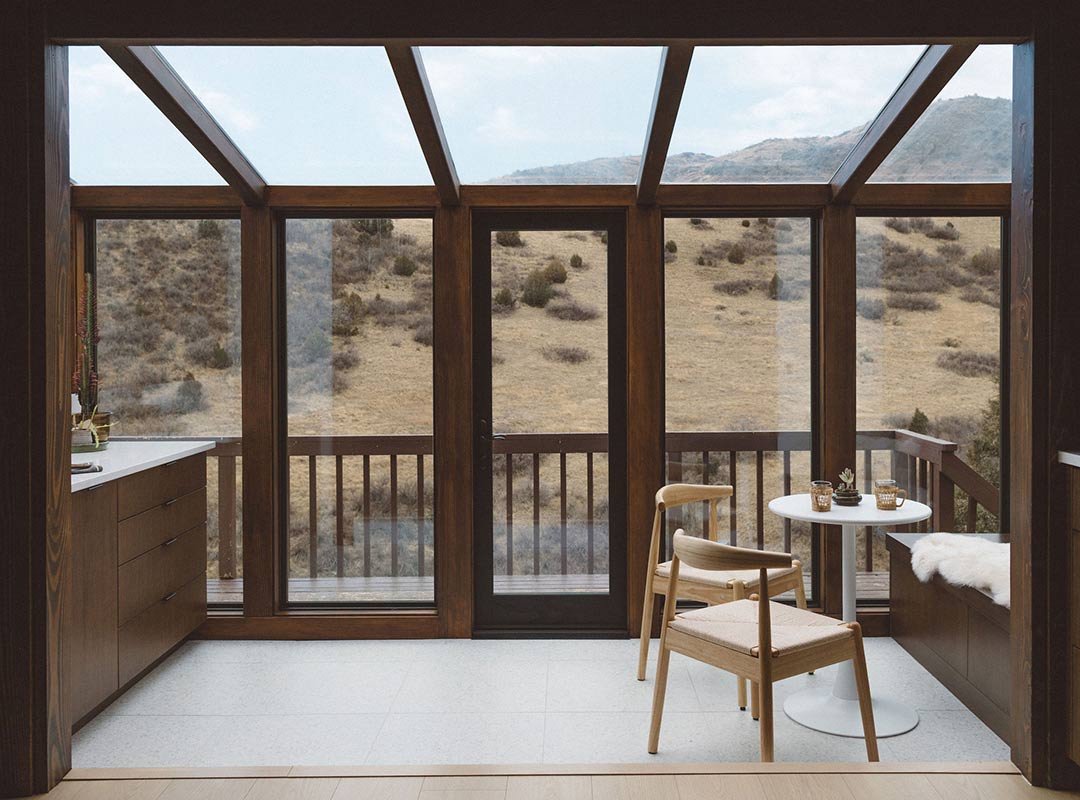 Sunroom 'after' image - J. Reiko Design + Co - Redstone Canyon Project - before and after of a mountain modern remodel in Fort Collins, Colorado
