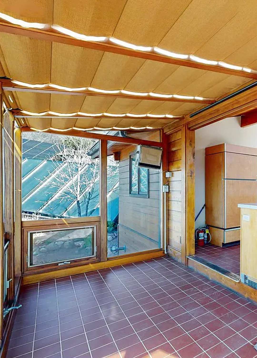 Sunroom 'before' image - J. Reiko Design + Co - Redstone Canyon Project - before and after of a mountain modern remodel in Fort Collins, Colorado