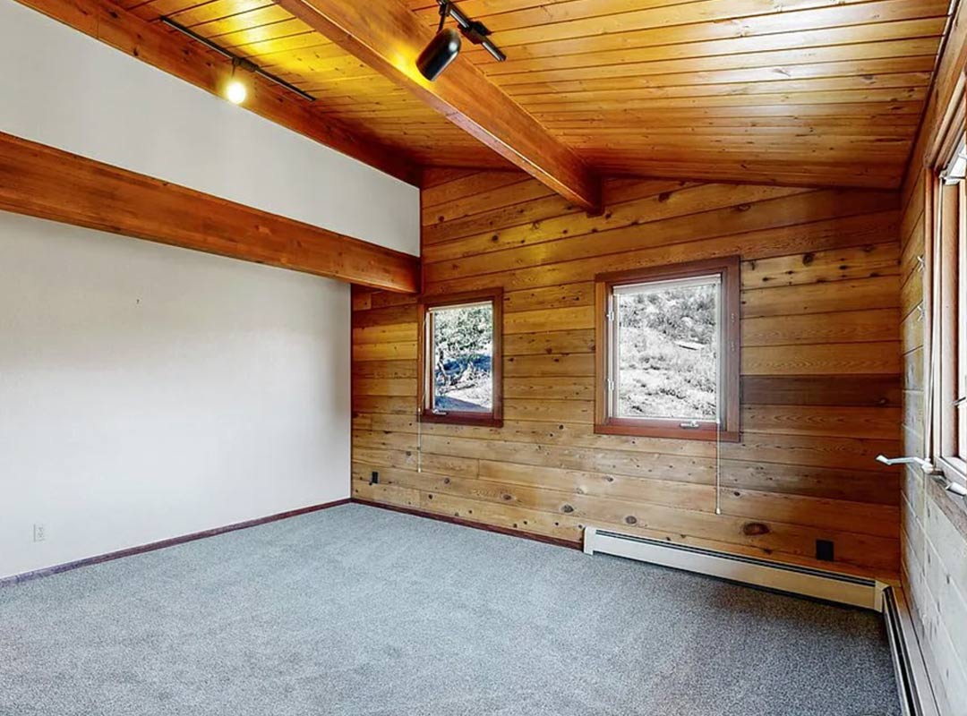 Bedroom 'before' image - J. Reiko Design + Co - Redstone Canyon Project - before and after of a mountain modern remodel in Fort Collins, Colorado