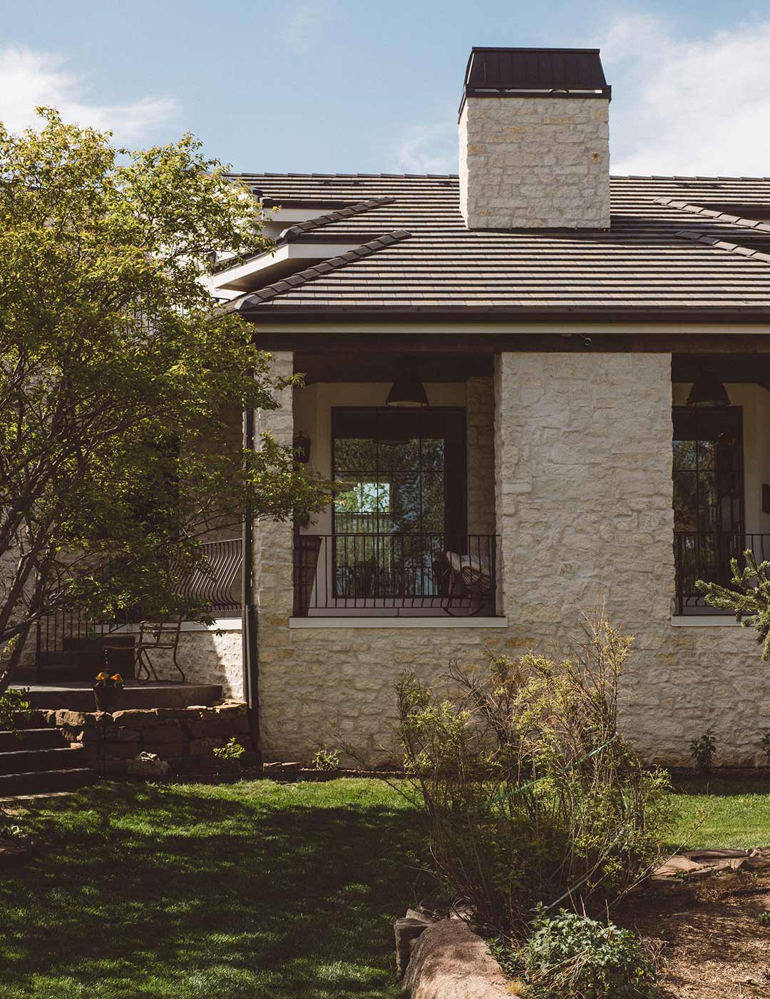 Exterior 'after' image - J. Reiko Design + Co - Augusta Trail - before and after of a European farmhouse remodel in Fort Collins, Colorado