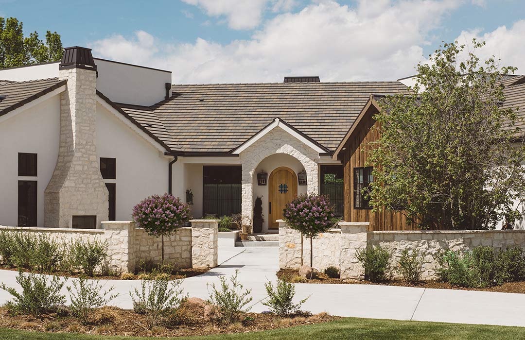 Exterior front 'after' image - J. Reiko Design + Co - Augusta Trail - before and after of a European farmhouse remodel in Fort Collins, Colorado