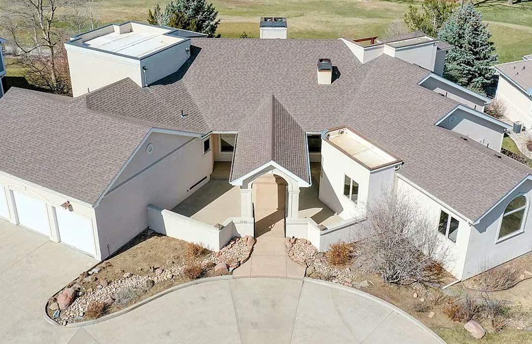 Exterior front 'before' image - J. Reiko Design + Co - Augusta Trail - before and after of a European farmhouse remodel in Fort Collins, Colorado