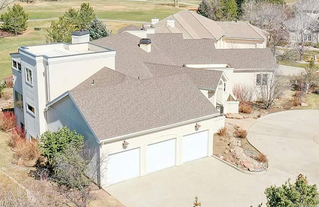 Exterior garage 'before' image - J. Reiko Design + Co - Augusta Trail - before and after of a European farmhouse remodel in Fort Collins, Colorado